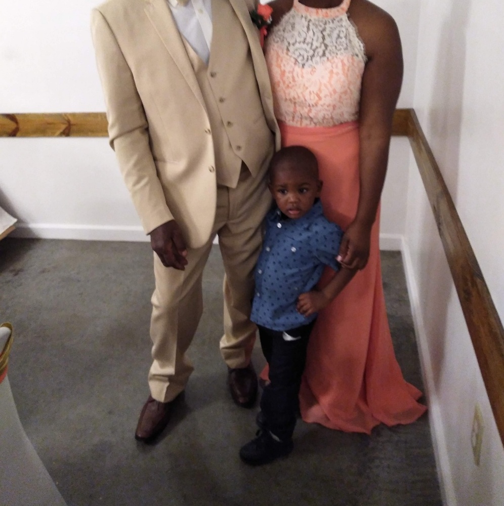 Selling the his beautiful coral dress.